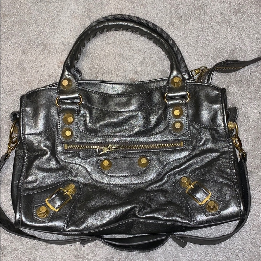 Beautiful silver metallic bag with gold hardware